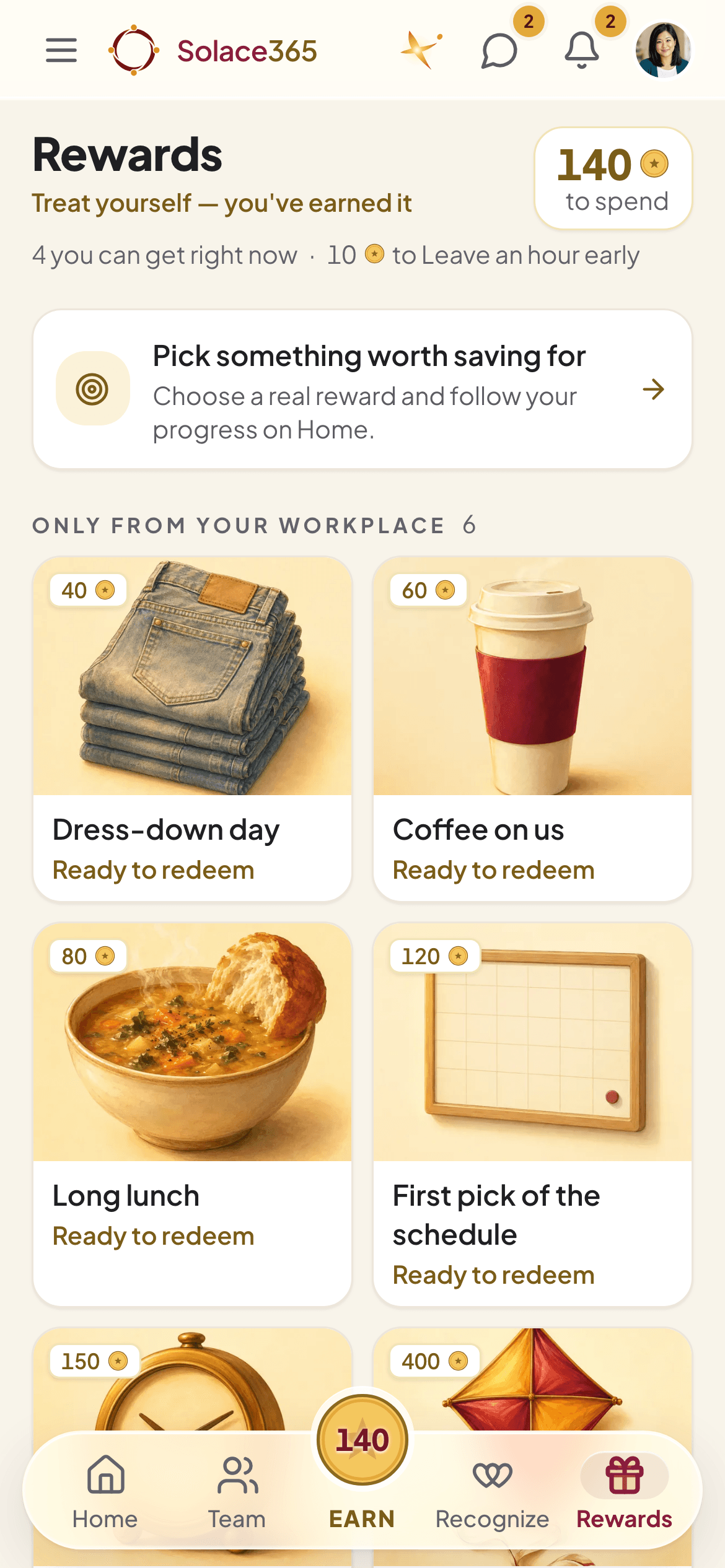 The Rewards shop on a phone: 140 coins to spend, and painted reward cards from the workplace such as Dress-down day, Coffee on us, Long lunch and First pick of the schedule, each with its price in coins.
