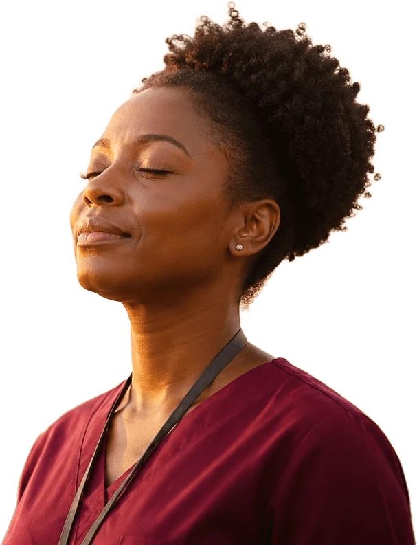 A behavioral-health caregiver in maroon scrubs resting peacefully
